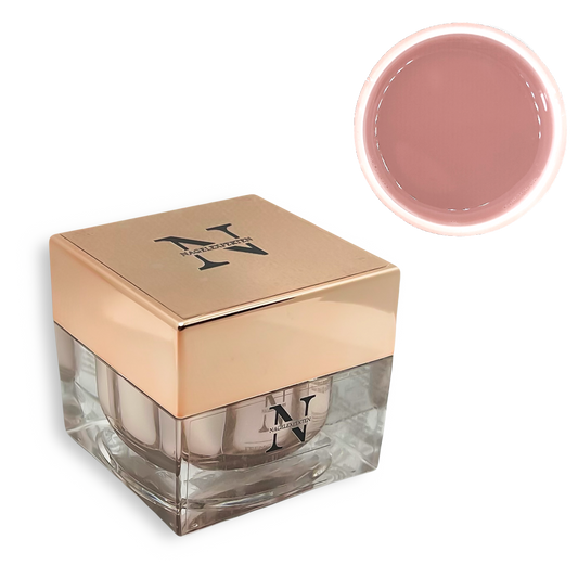 Fyrkantig builder gel burk med guldigt lock som det står Nagelexperten på. Ovanför är en rund cirkel som visar att färgen innehåller beige nagel gel.