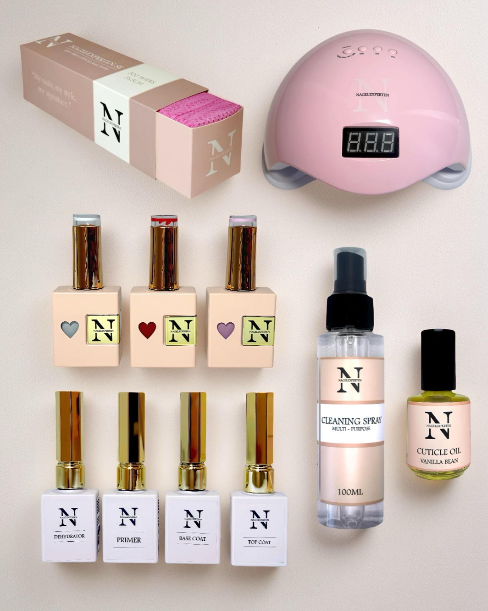 Gellack startkit med rosa UV-lampa, gellack, base coat och top coat.